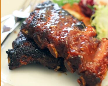BBQ Ribs on Charcoal Grill BBQ Ribs on Charcoal Grill